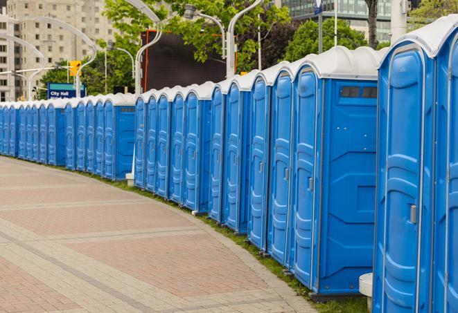 multiple portable restrooms in a neat and tidy row in Aurora